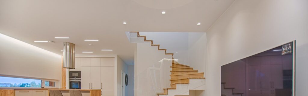 Turned-on Gray Flat Screen Smart Tv